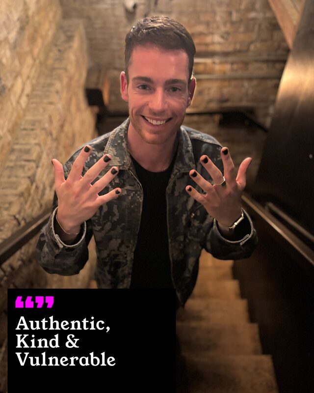 Connor Davey holding up his painted nails. His three words: Authentic, Kind and Vulnerable.