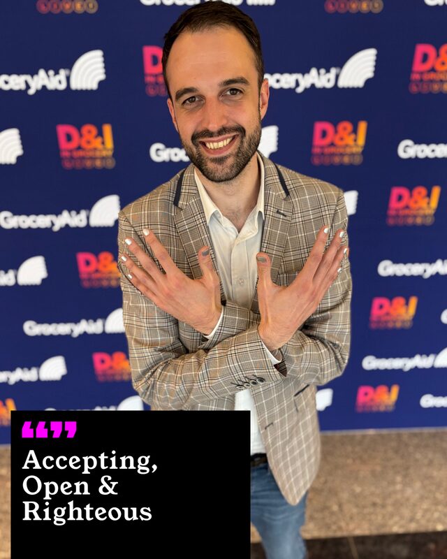 Dave Netley holding up his painted nails. His three words: Accepting, Open and Righteous.