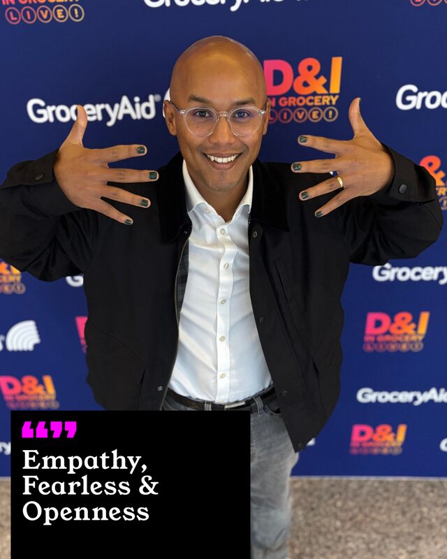 Kiran Fraser-Neve holding up his painted nails. His three words: Empathy, Fearless and Openness.