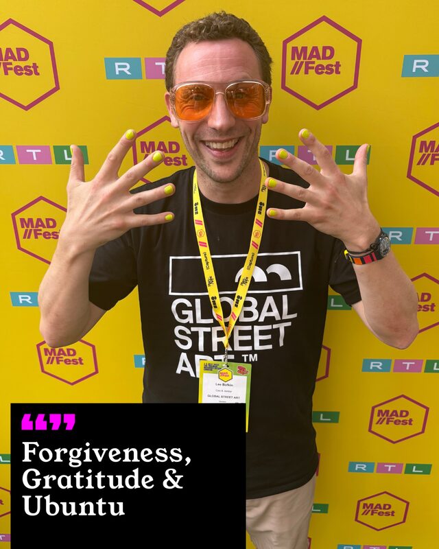 Lee Bofkin holding up his painted nails. His three words: Forgiveness, Gratitude and Ubuntu.