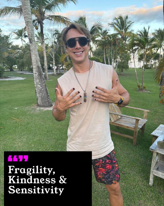 Luiz Rizati holding up his painted nails. His three words: Fragility, Kindness and Sensitivity.
