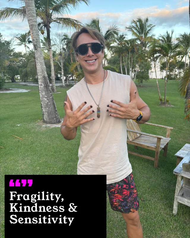 Luiz Rizati holding up his painted nails. His three words: Fragility, Kindness and Sensitivity.
