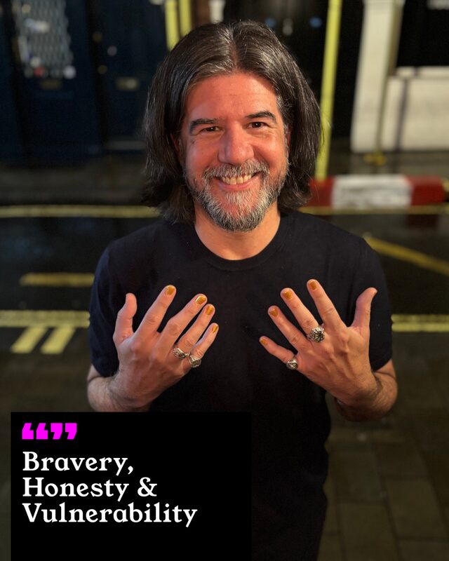 Pascal Barker holding up his painted nails. His three words: Bravery, Honesty and Vulnerability.