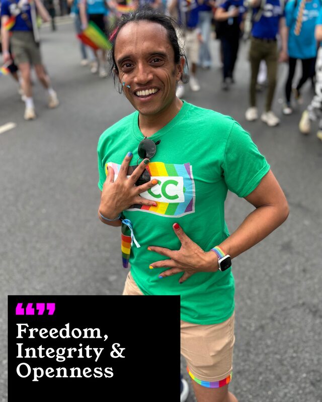 Sam Patel holding up his painted nails. His three words: Freedom, Integrity and Openness.