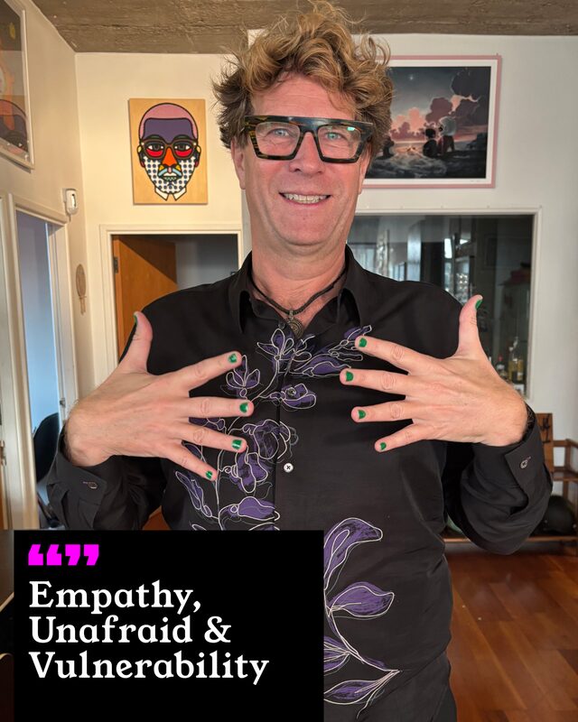 A participant holding up his painted nails. His three words: Empathy, Unafraid and Vulnerability.