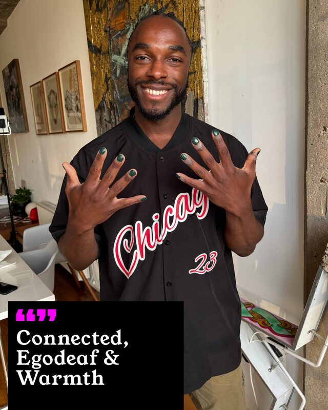A participant holding up his painted nails. His three words: Connected, Ego Death and Warmth.