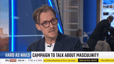 Sam Conniff talking about Hard As Nails on Sky News, with the on-screen caption reading &ldquo;Hard As Nails: campaign to talk about masculinity&rdquo;
